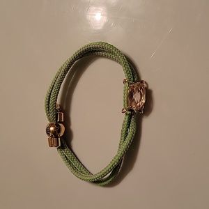 Juicy Couture pull cord bracelet with faceted pink stone